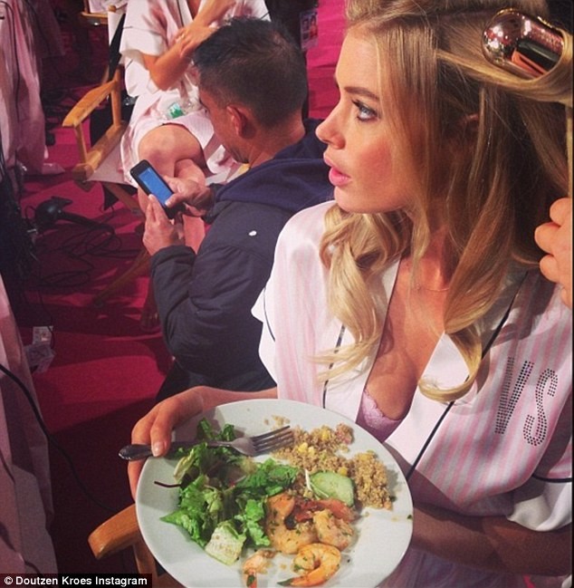 23A8C93B00000578-2856318-The_model_enjoys_a_healthy_lunch_of_prawns_salad_and_quinoa_whil-3_1417525541510
