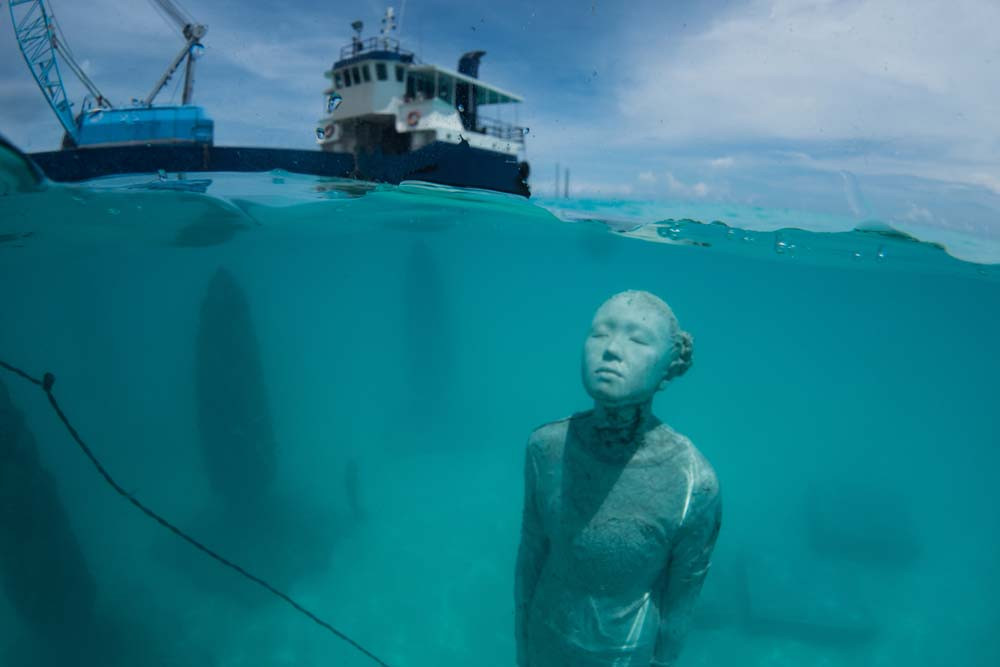 Submerged statue