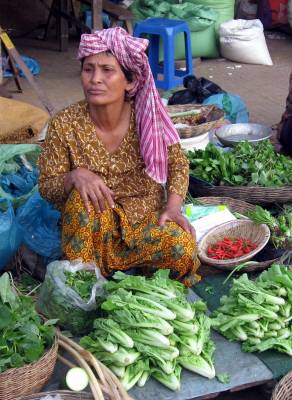 Market_Woman_in_Cambodia_with_Krama-by-Thomas-Schoch.jpg