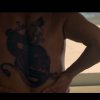 JLO's back tattoo in 'Follow the leader'.